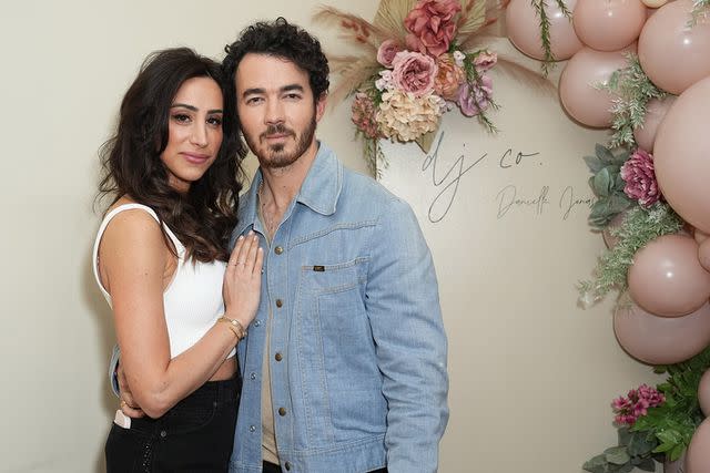 <p>John Nacion/Getty </p> Danielle and Kevin Jonas in May 2023