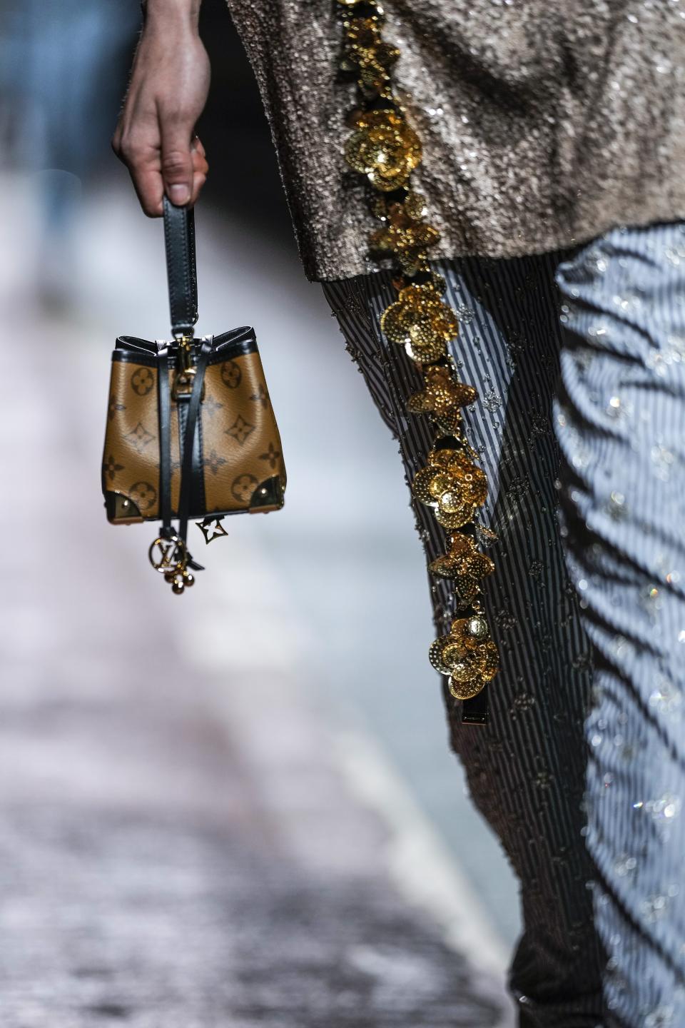 A model wears a creation for the Louis Vuitton Pre-Fall 2023 show in Seoul, South Korea, Saturday, April 29, 2023. (AP Photo/Lee Jin-man)