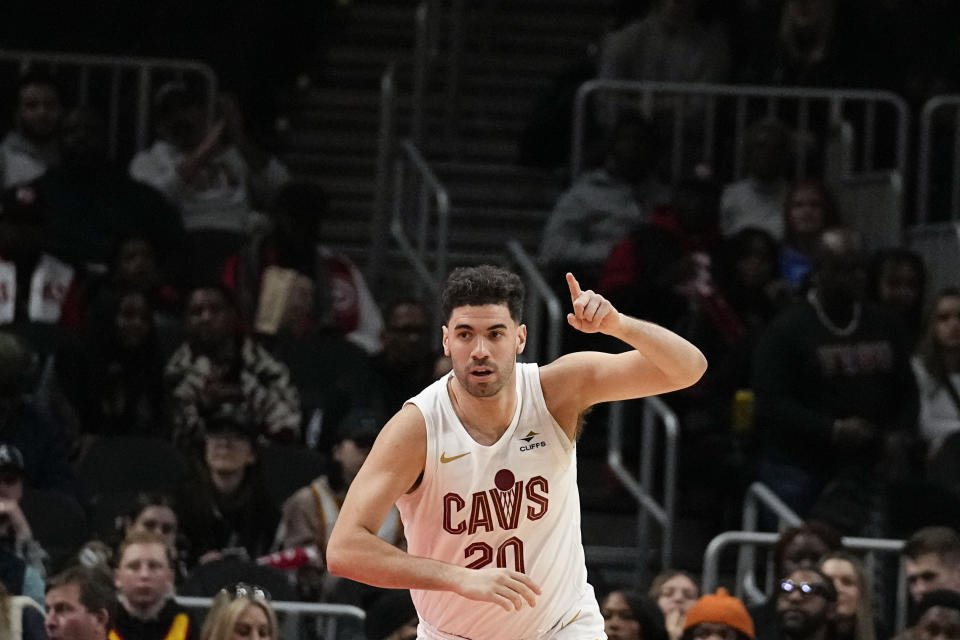 Cleveland Cavaliers forward Georges Niang (20) celebrates after scoring in the first half of an NBA basketball game against the Atlanta Hawks, Saturday, Jan. 20, 2024, in Atlanta. (AP Photo/Brynn Anderson)