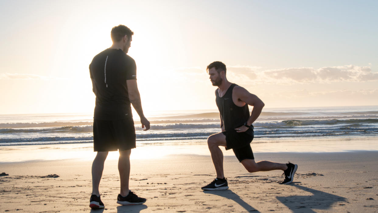  Chris Hemsworth working out with his trainer Luke Zocchi. 