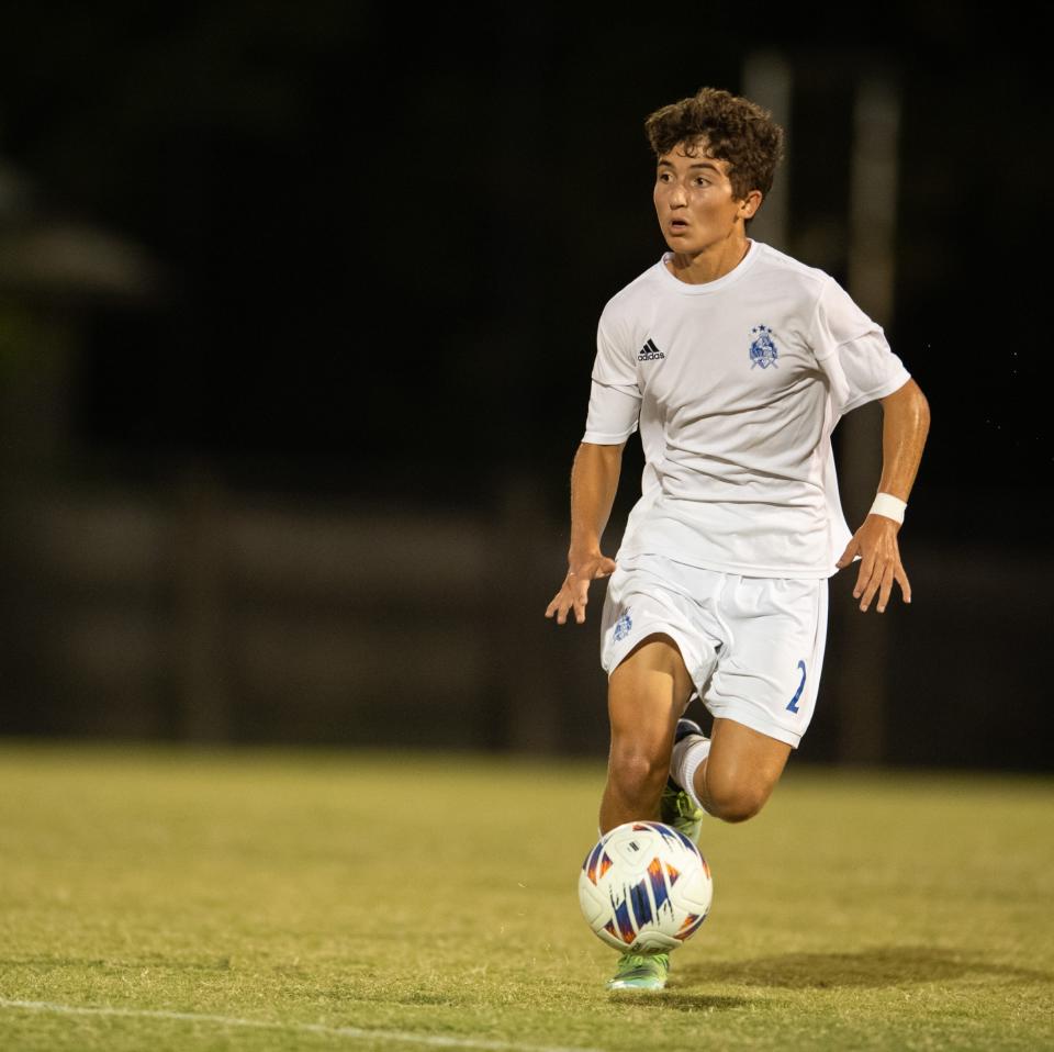 Castle’s Addison Day (2) dribbles the ball down the field as the Castle Knights play the Memorial Tigers at Memorial High School in Evansville, Ind., Wednesday evening, Sept. 14, 2022. 