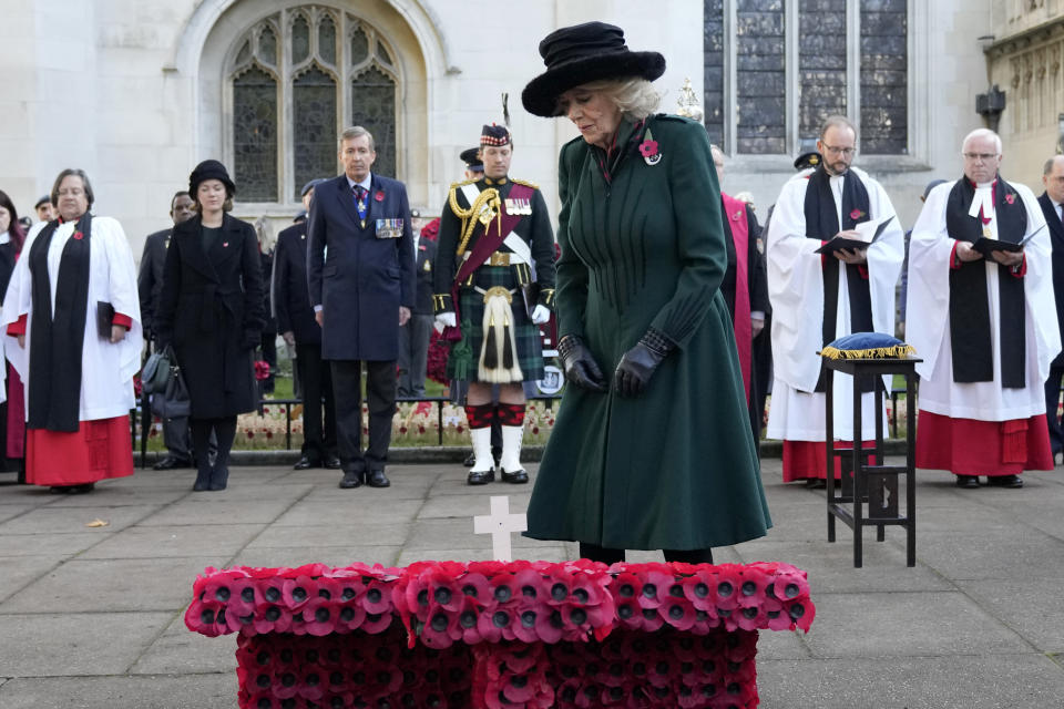 FILE - Britain's Camilla, Duchess of Cornwall, Patron of the Poppy Factory, after she lays a Cross of Remembrance at the 93rd Field of Remembrance at Westminster Abbey in London, Thursday, Nov. 11, 2021. (AP Photo/Frank Augstein, Pool, File)