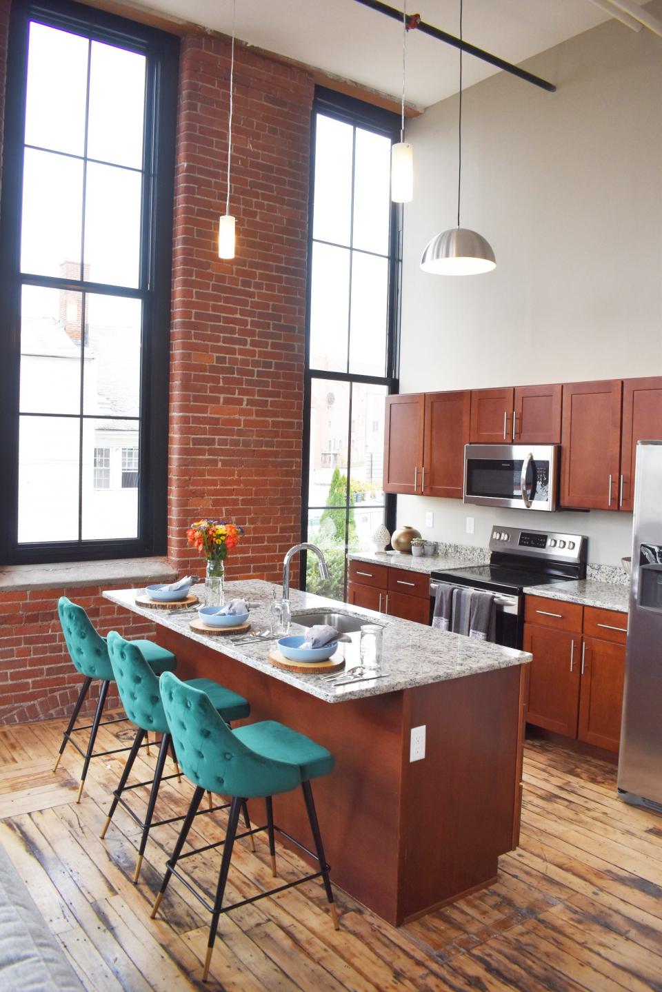 The kitchen area in one of the apartments at the old Durfee Tech.