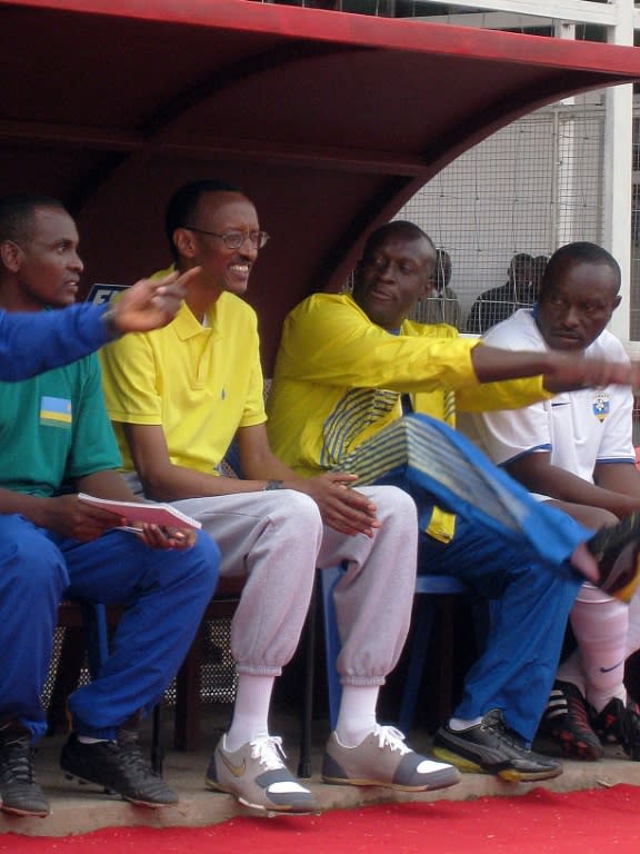 Football diplomacy featured large in Kagame's visit to neighbouring Burundi in 2008. Kagame, second from left, watched a match with his former sports minister, Joe Habineza. Football-mad Burundian President Pierre Nkurunziza has his own team, Allelua