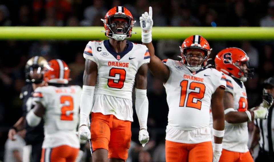 Syracuse Orange Isaiah Johnson (3) celebrates after making a stop during the NCAA football game against the Purdue Boilermakers, Wednesday, July 12, 2023, at Ross-Ade Stadium in West Lafayette, Ind. Syracuse Orange won 35-20.