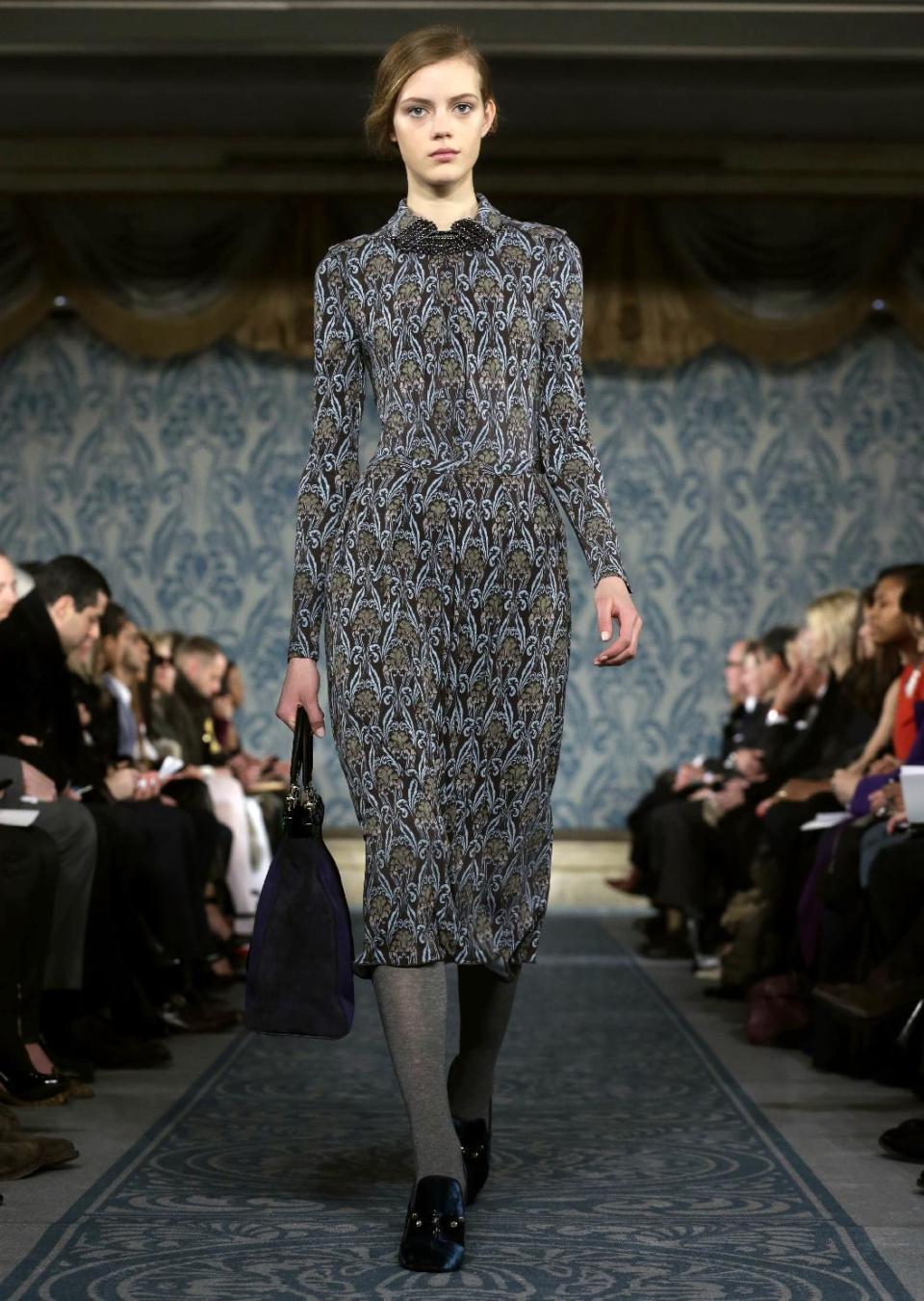 The Tory Burch Fall 2013 collection is modeled during Fashion Week in New York on Tuesday, Feb. 12, 2013. (AP Photo/Richard Drew)