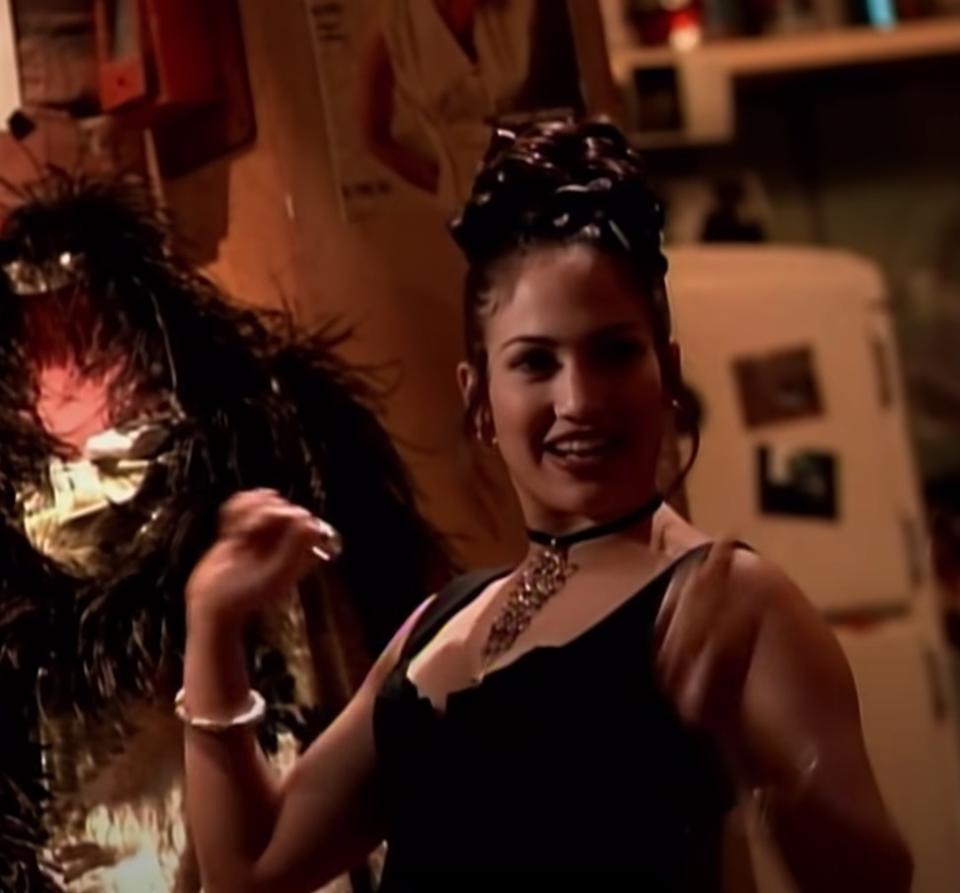 Jennifer Lopez talks to Janet Jackson in her "That's the Way Love Goes" music video