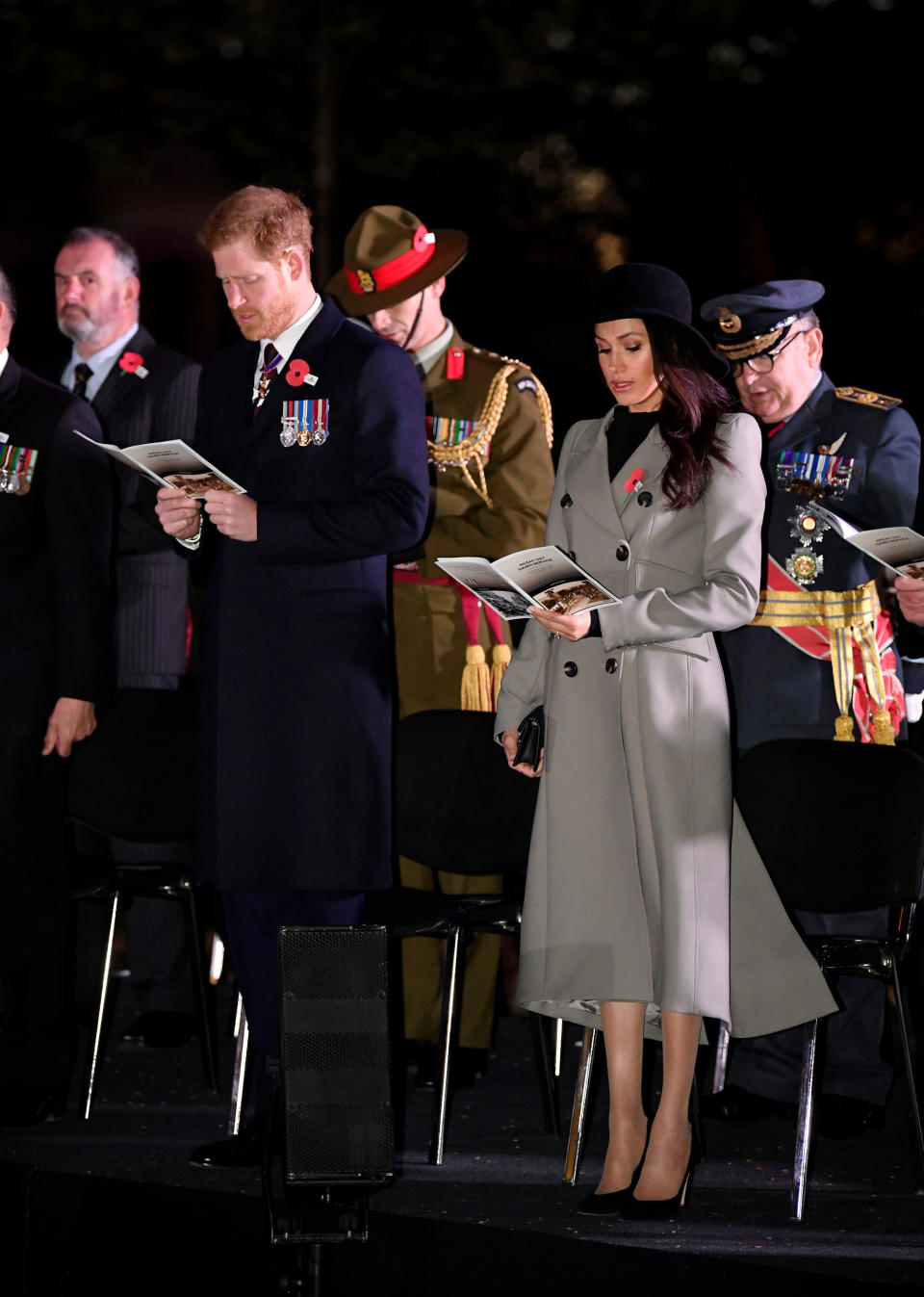 Meghan and Harry looked sombre as they attended the event. Photo: AAP