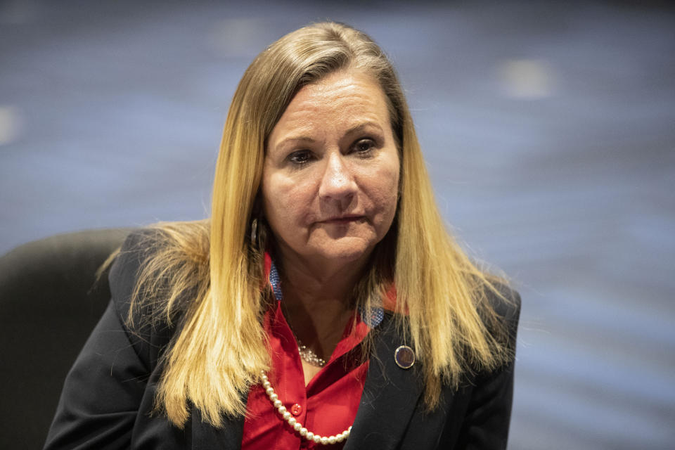 In this Feb. 2, 2021, photo, Virginia Sen. Amanda Chase and Republican gubernatorial candidate, speaks from her desk at the Science Museum of Virginia in Richmond, Va. The national Republican Party is at war with itself, struggling to reconcile a bitter divide between former President Donald Trump’s fierce loyalists and those who want Trumpism purged from their party. Chase is a polarizing state senator who seems to have won the hearts and minds of the Trump faithful with her fiercely anti-establishment, pro-gun positions and her embrace of the false notion that Trump is the legitimate winner of the November election. (AP Photo/Ryan M. Kelly)