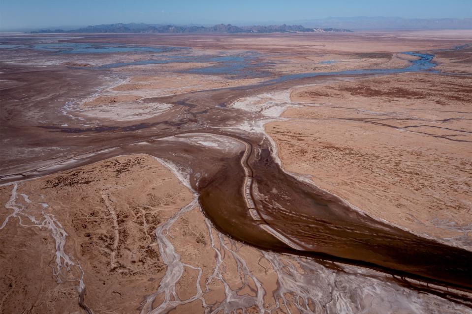 At its terminus in Baja California, Mexico, the Colorado River, now stretched beyond its limits, reaches for the sea. But like mother nature’s version of Michelangelo’s “The Creation of Adam,” their reach isn’t enough. The last time the Colorado met the Sea of Cortès was March 2014. | Spenser Heaps, Deseret News