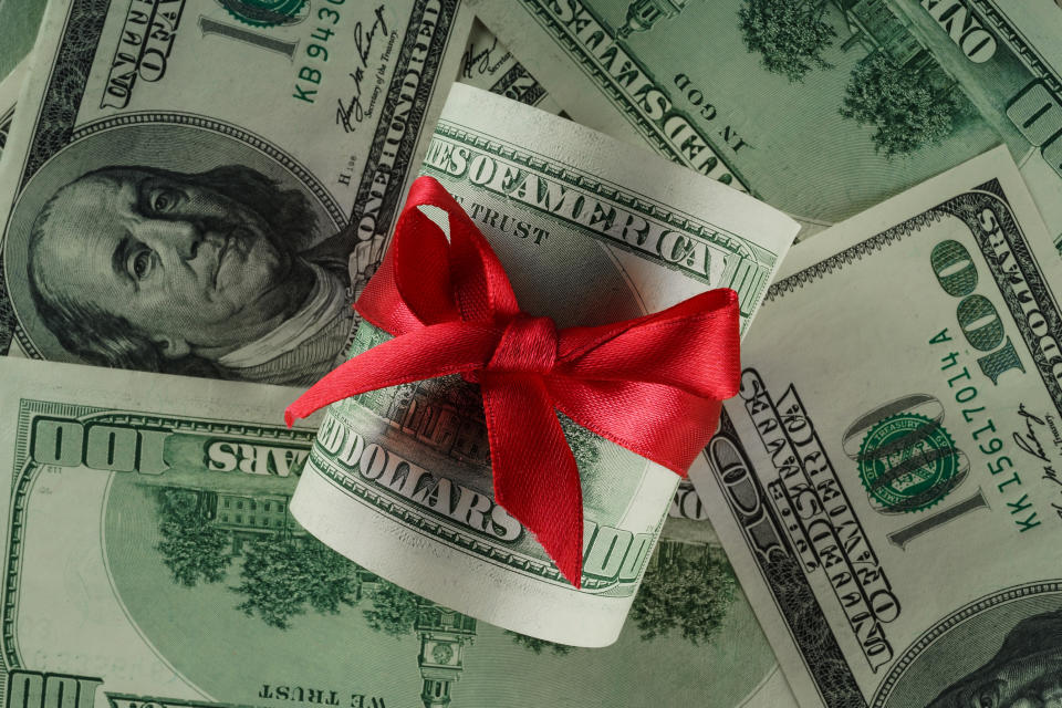Cash wrapped in a bow.