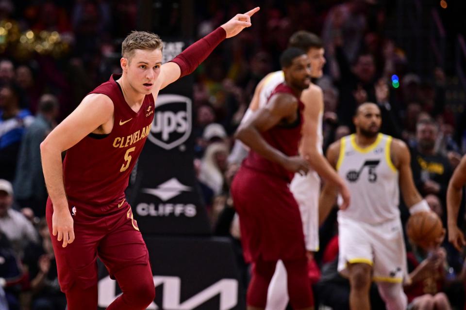 Cleveland Cavaliers guard Sam Merrill reacts after making a 3-pointer Wednesday against the Utah Jazz in Cleveland.