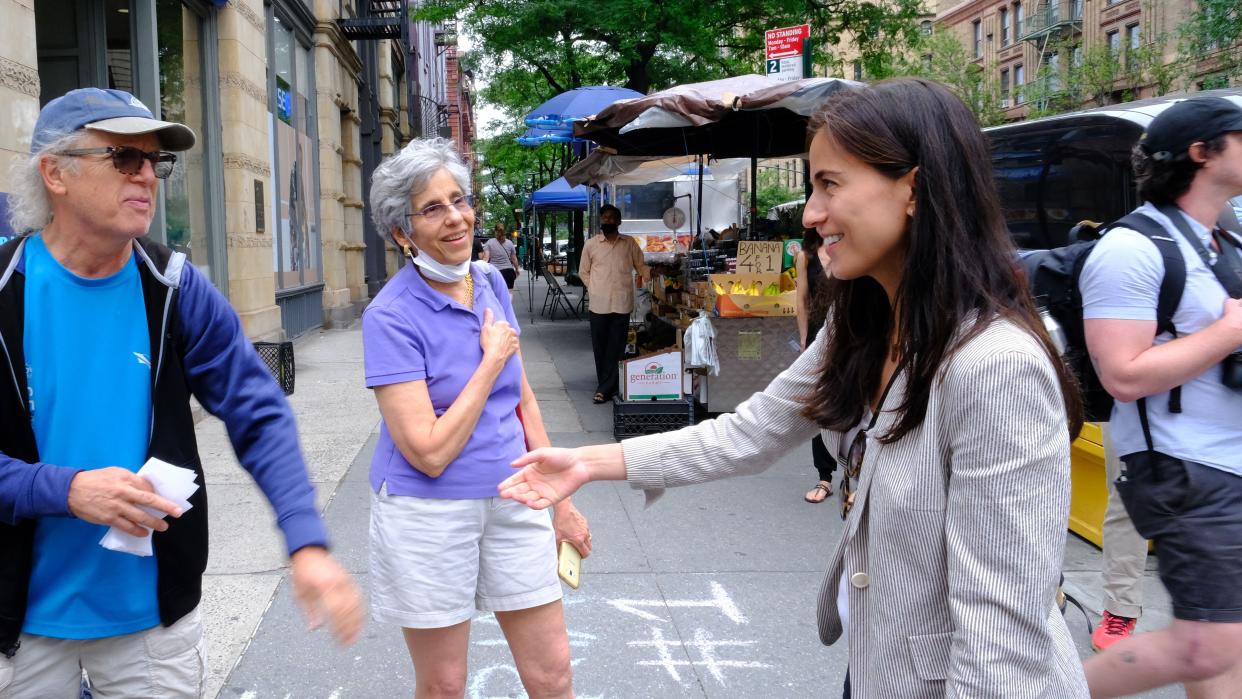 Manhattan District Attorney Candidate Tali Farhadian Weinstein is pictured greeting potential voters while campaigning on the corner of 72nd Street and Columbus Avenue on Tuesday, June 22, 2021.