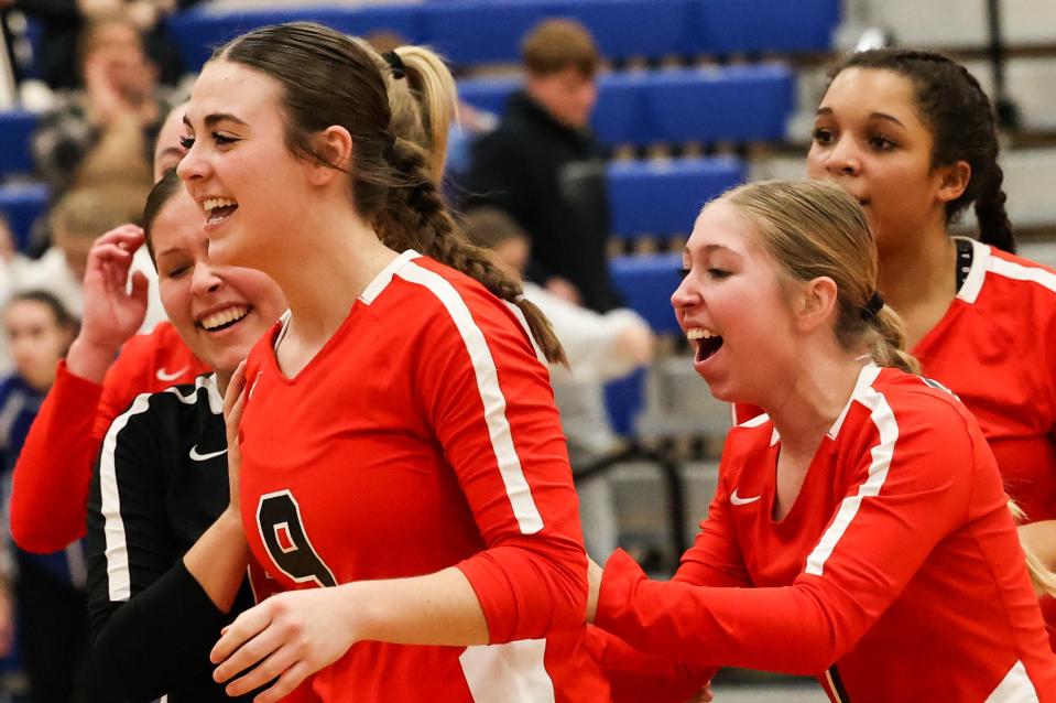 Orrville's Sophie Pertee and teammates are ecstatic after clinching their five-set win over Northwestern.