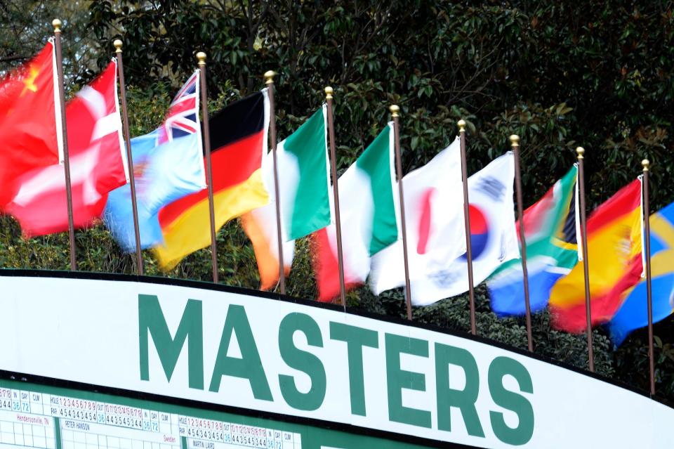 Flags on the Masters scoreboard wave in the wind during the second practice round for the 2013 Masters Tournament at Augusta National Golf Club on Tuesday, April 9, 2013, in Augusta, Ga.