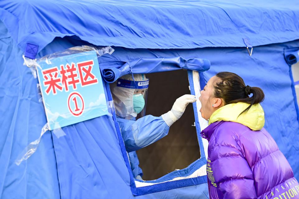HOHHOT, CHINA - FEBRUARY 27, 2022 - A medical worker performs the ninth nucleic acid sampling at a community nucleic acid sampling site in Hohhot, Inner Mongolia, China, February 27, 2022. (Photo credit should read Costfoto/Future Publishing via Getty Images)