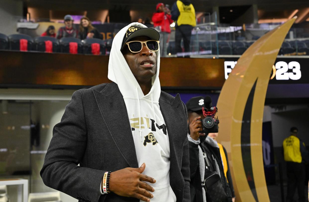 Deion Sanders in attendance at  the College Football Playoff national championship game between the TCU Horned Frogs and Georgia Bulldogs at SoFi Stadium.