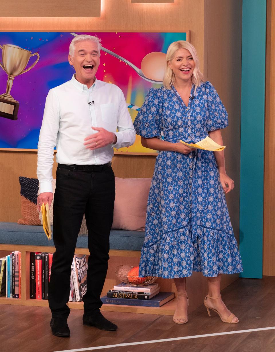 It was the first of two outfits for Holly Willoughby on Monday, as she later spent the afternoon at Wimbledon in spotted vintage-style dress. (Shutterstock)