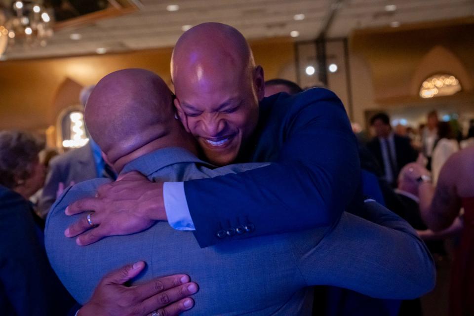 Maryland Governor Wes Moore hugs a supporter at the Maryland Democratic Party Gala 2024 fundraiser at Martin’s Crosswinds in Greenbelt, MD, on Thursday, June 20, 2024.