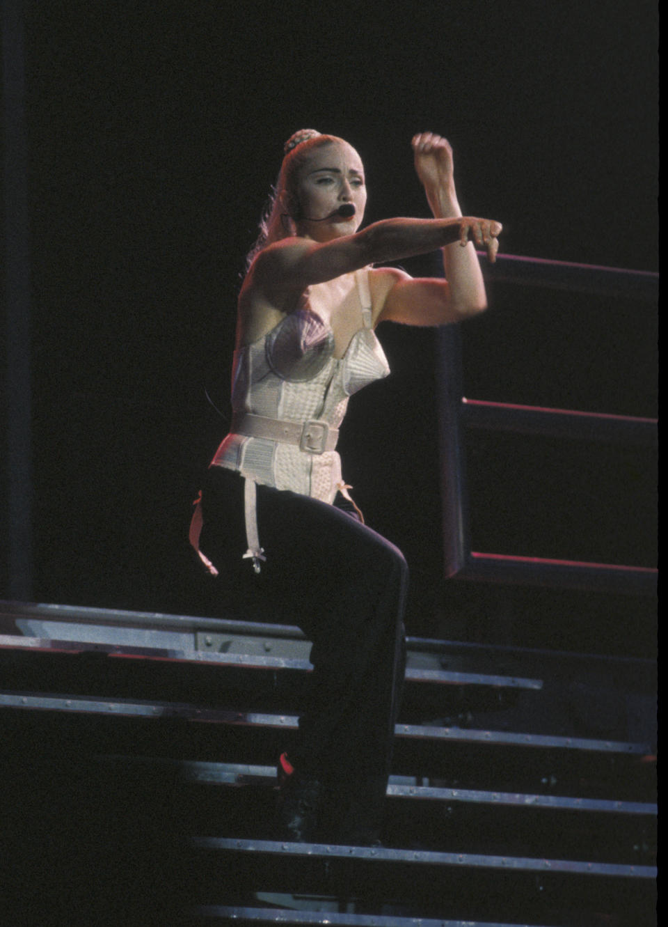 <em>April 1990</em>  Madonna's cone bra has taken on many iterations, including during her recent "MDNA" Tour. Its genesis came at the hands of Jean-Paul Gaultier during the Blonde Ambition Tour, sparking backlash as well as numerous copycat versions.