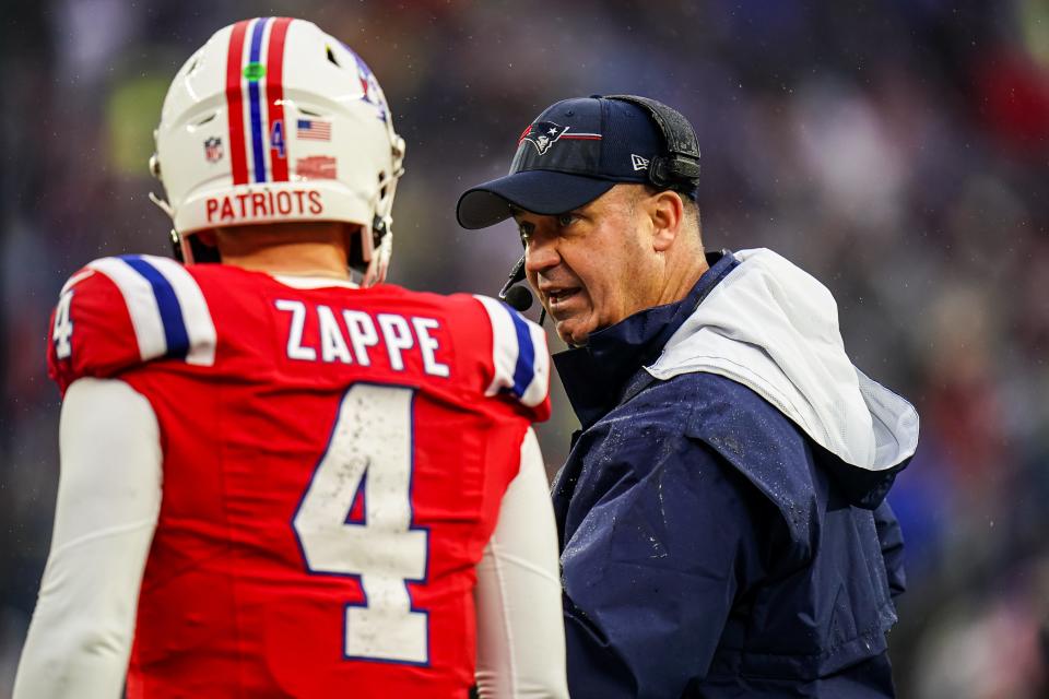 Patriots offensive coordinator Bill O'Brien talks with quarterback Bailey Zappe during a game against the Chargers on Dec. 3.