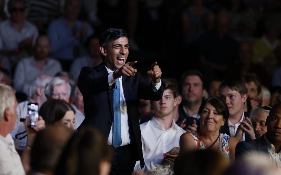 Rishi Sunak makes his way to the stage in Cheltenham - Jamie Lorriman for The Telegraph