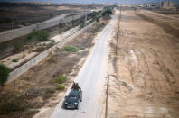 Members of Palestinian security forces loyal to Hamas patrol on the border with Egypt, in Rafah in the southern of Gaza Strip August 17, 2017. REUTERS/Ibraheem Abu Mustafa