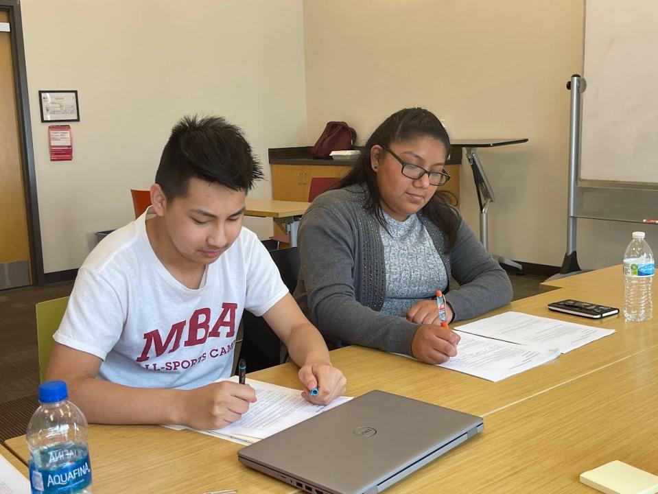 Ali Mastan and Emelyn Garcia work in the English Learners Department at Cane Ridge High School. Both are high school students who participated in a work-based learning program at Metro Nashville Public Schools.