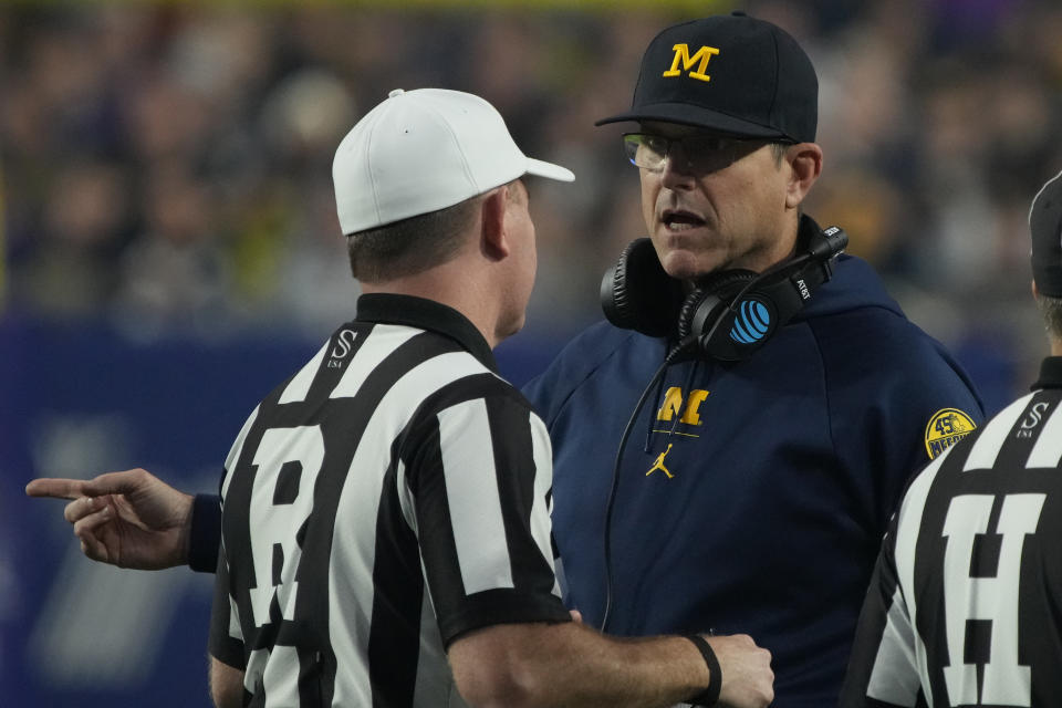 Michigan head coach Jim Harbaugh during the first half of the Fiesta Bowl NCAA college football semifinal playoff game against TCU, Saturday, Dec. 31, 2022, in Glendale, Arizona. (AP Photo/Rick Scuteri)