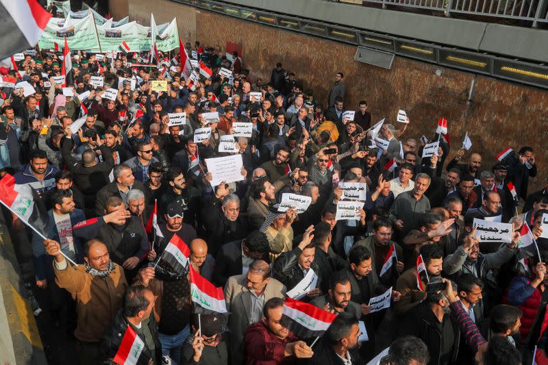 Iraqi demonstrators gather during ongoing anti-government protests in Baghdad