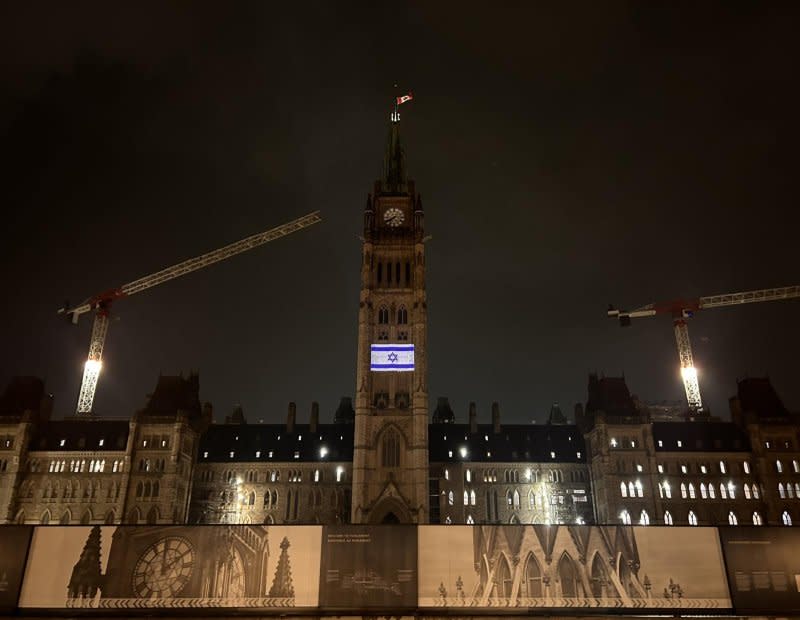An Israeli flag was illuminated on the Peace Tower of the Canadian Parliament on Monday night in a show of solidarity with Israel. Canada has said that at least one national was reportedly killed in Israel and three others are missing. Photo courtesy of Speaker of the House of Commons/Twitter