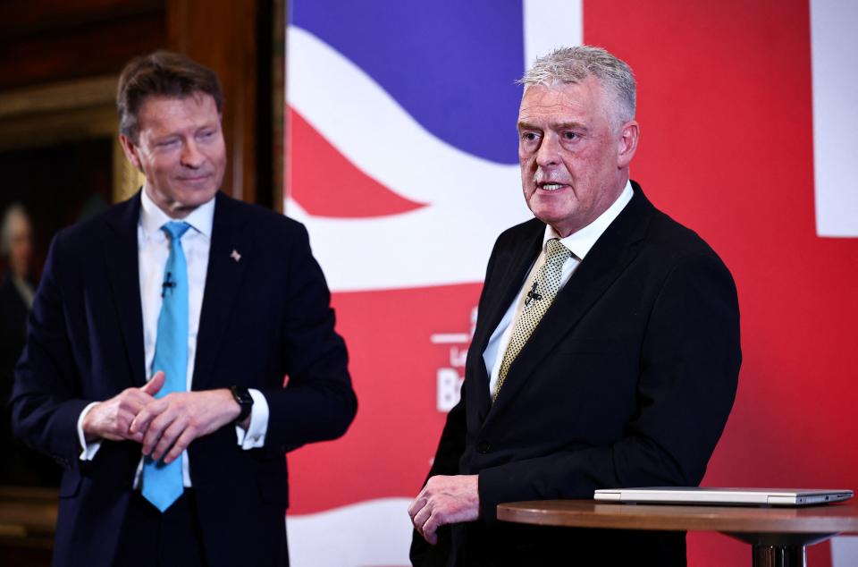 Former Conservative deputy chairman Lee Anderson (R) and Leader of Reform UK party Richard Tice (L) speak during a press conference to announce his defection from the Conservative party to Reform UK, in London, on March 11, 2024. (Photo by HENRY NICHOLLS / AFP) (Photo by HENRY NICHOLLS/AFP via Getty Images)