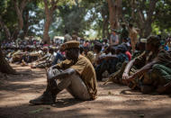 <p>Newly released child soldiers attend sit as they attend their release ceremony in Yambio, South Sudan on Feb. 7, 2018. (Photo: Stefanie Glinski/AFP/Getty Images) </p>