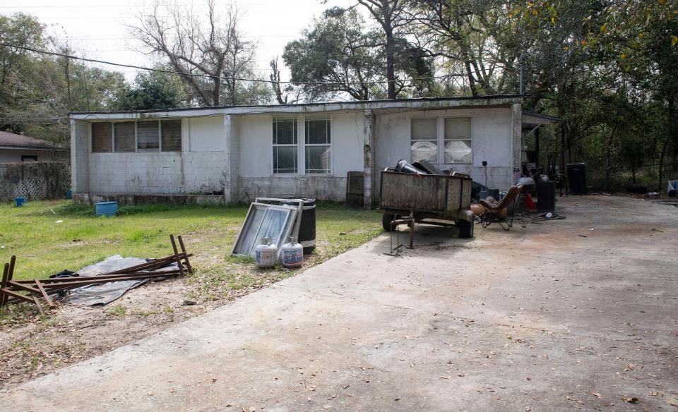 The resident living at this home on Petunia Avenue faces sanctions by Escamia County Code Enforcement.