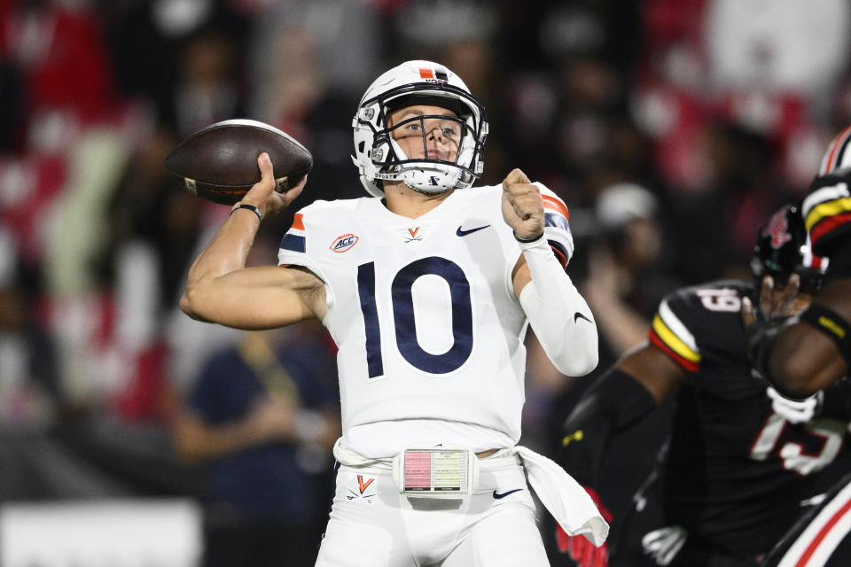 Virginia quarterback Anthony Colandrea (10) throws a pass during the first half of an NCAA college football game against Maryland, Friday, Sept. 15, 2023, in College Park, Md. (AP Photo/Nick Wass)