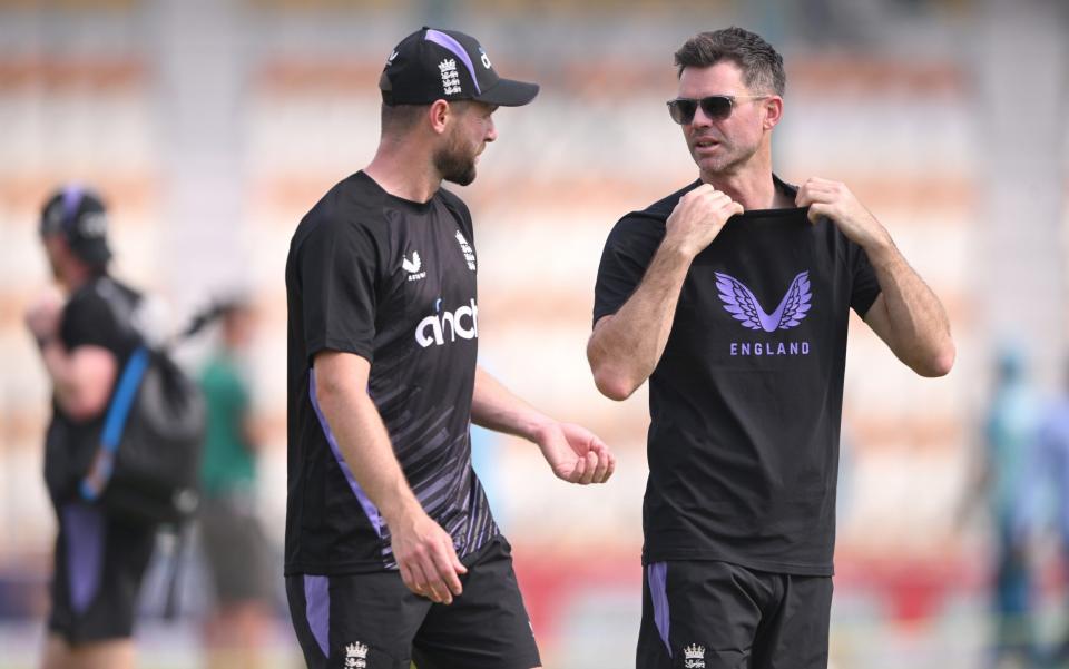 Chris Woakes speaks with James Anderson before the start of day two