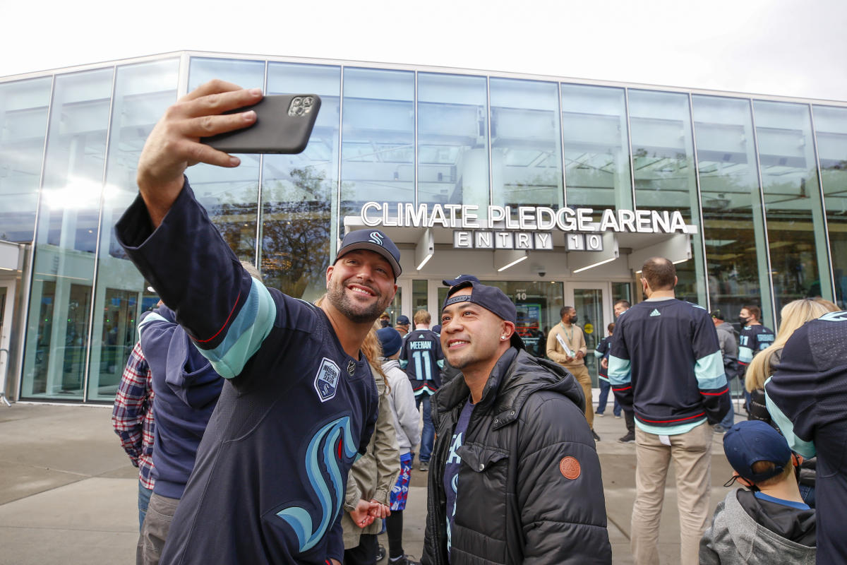 We live for hockey': Climate Pledge Arena fans show they are committed to  Kraken on opening night