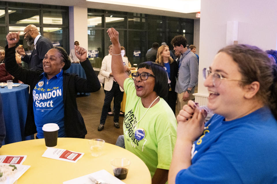 Diana Turner, Rita Crews and Rebecca Mark celebrate as election results roll in during the watch party for Baltimore Mayor Brandon Scott, in Baltimore, Tuesday, May 14, 2024. Scott is facing off against former mayor Sheila Dixon. (Jessica Gallagher/The Baltimore Banner via AP)