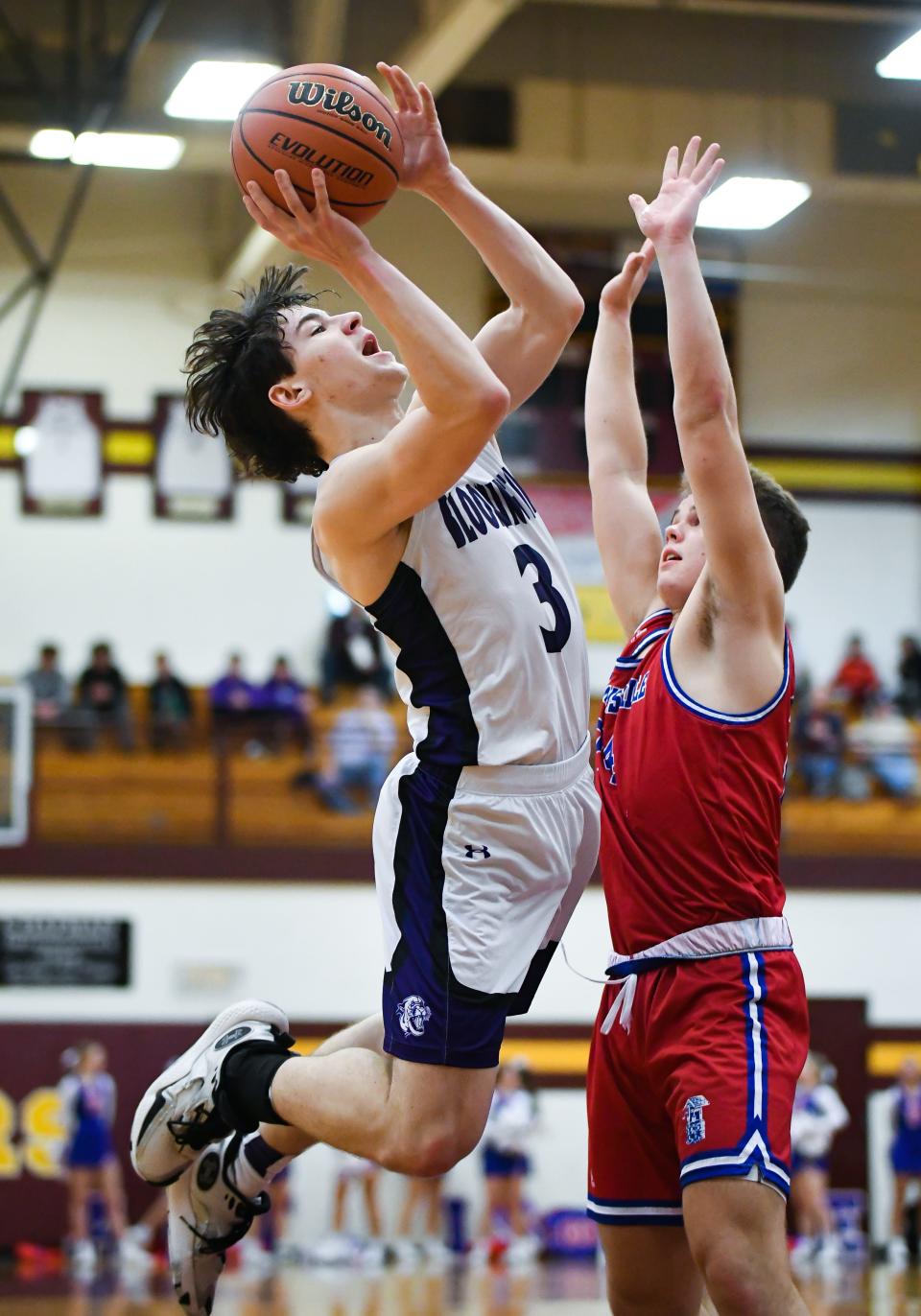 Bloomington South’s Jack Clark (3) attempts a shot past Martinsville’s Grady Gardner (24) during the IHSAA boys’ basketball sectional semifinal game at Bloomington North on Friday, March 1, 2024.