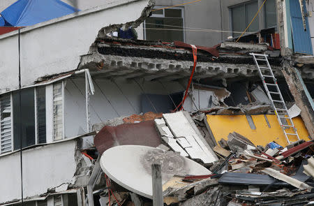 Debris are pictured at the site of a collapsed building after an earthquakein Mexico City, Mexico September 21, 2017. REUTERS/Henry Romero