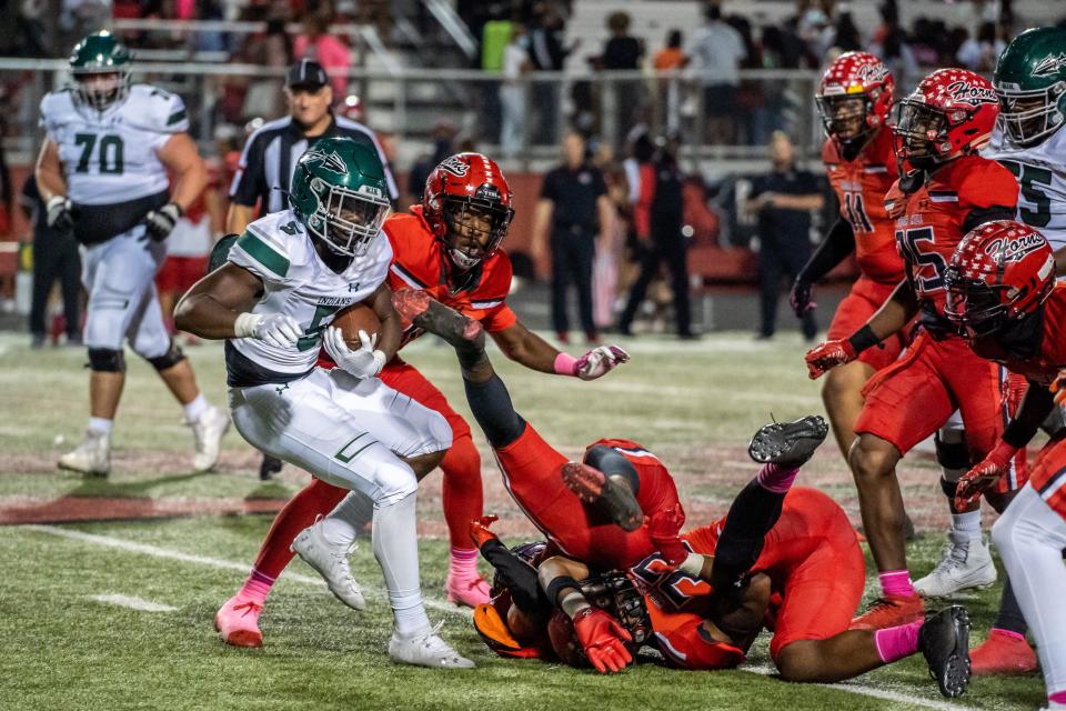 Waxahachie running back Jayden Becks finds the way blocked during Friday night's District 11-6A game at Cedar Hill. The Longhorns scored late to edge the Indians, 14-10.