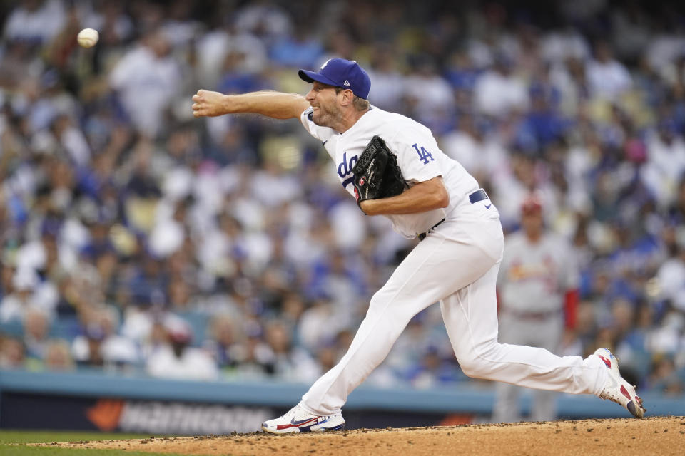 Los Angeles Dodgers starting pitcher Max Scherzer (31) throws during the second inning of a National League Wild Card playoff baseball game against the St. Louis Cardinals Wednesday, Oct. 6, 2021, in Los Angeles. (AP Photo/Marcio Jose Sanchez)