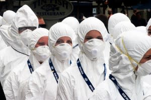 People in white masks