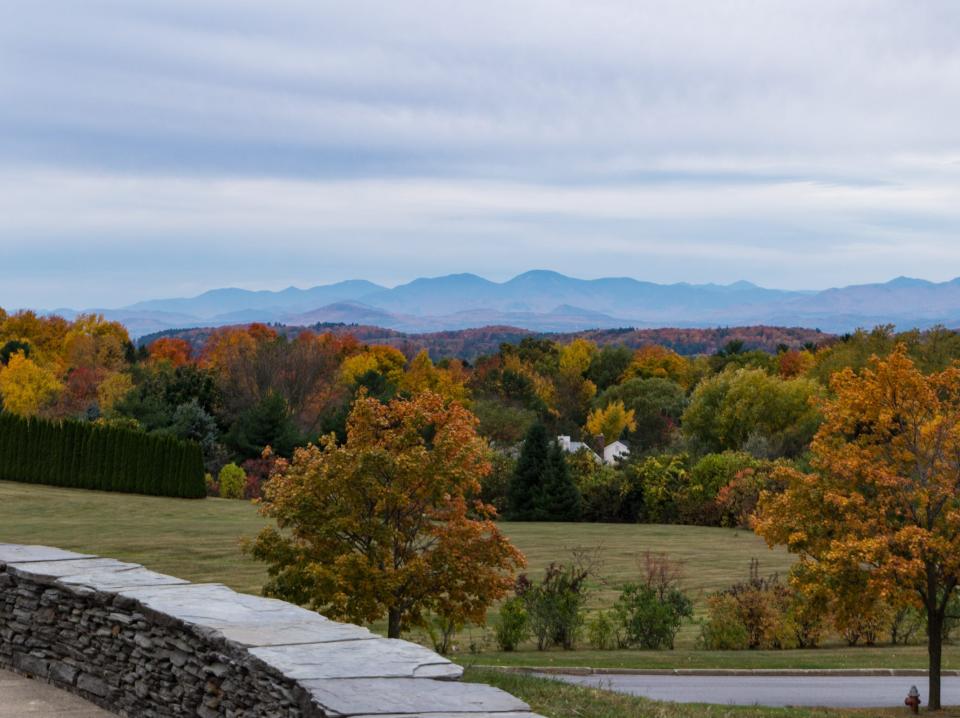 Fall foliage and Adirondack Mountains in New York from Overlook Park in South Burlington, Vermont.