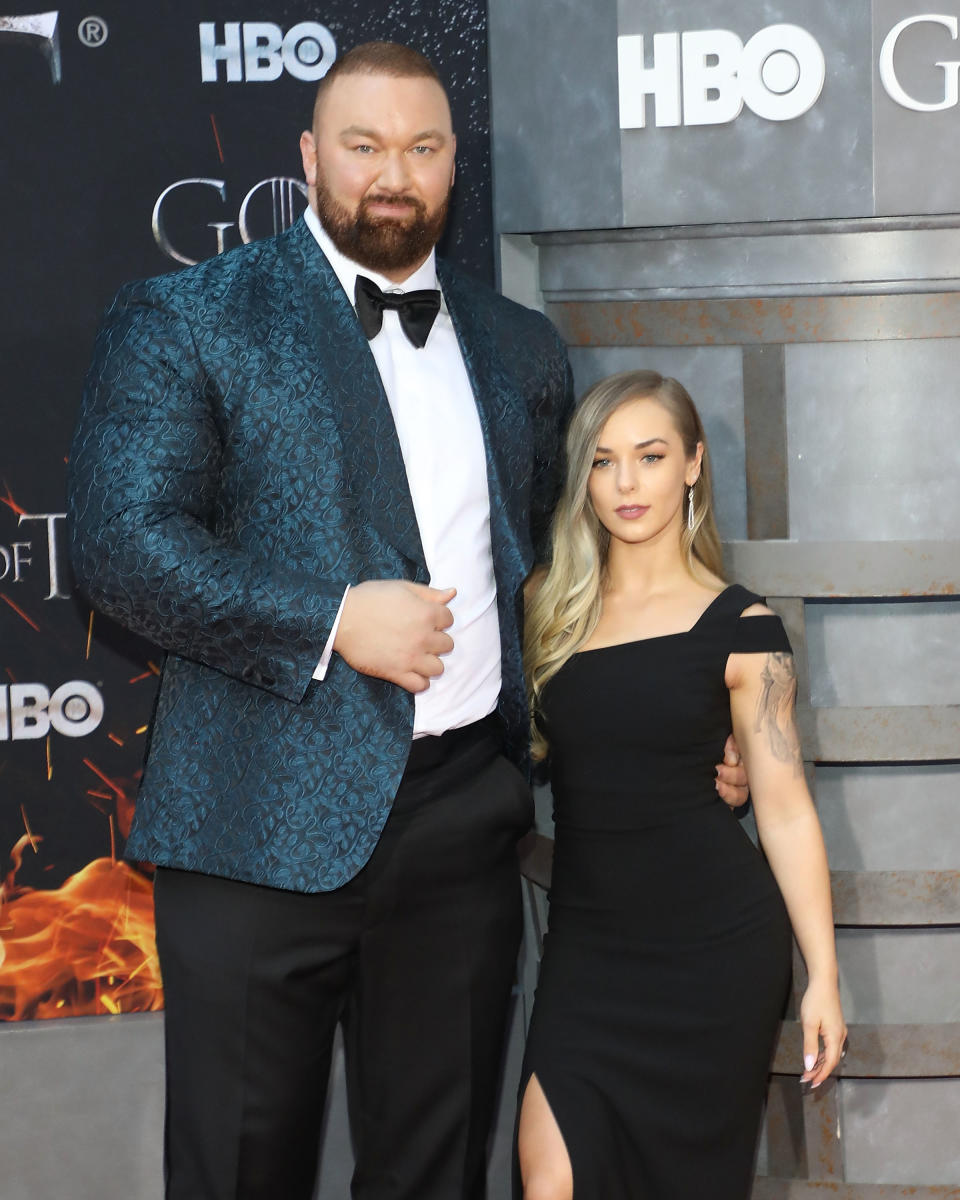 Hafthor Julius Bjornsson and Kelsey Henson attend the premiere of 'Game of Thrones' at Radio City Music Hall on April 3, 2019 in New York City.  (Photo by Taylor Hill/Getty Images)