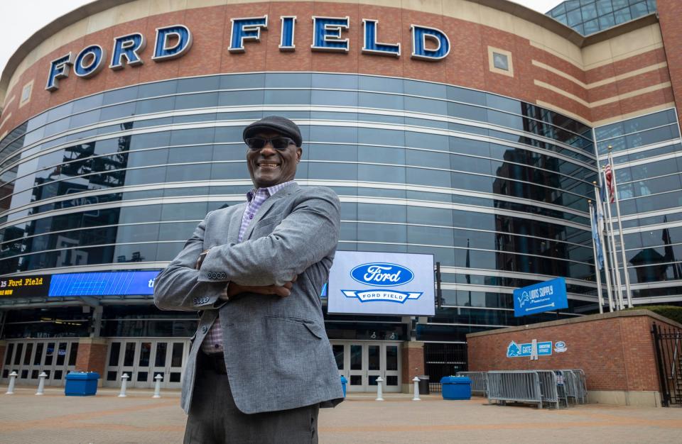 Luther Bradley, a first-round draft pick of the Detroit Lions in 1978 who is currently a Blue Cross Blue Shield of Michigan consultant, stands outside the Ford Field main entrance in Detroit on Tuesday, April 25. Bradley also is the proud uncle of Detroit Lions Executive Vice President and General Manager Brad Holmes.