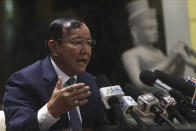 Cambodian Foreign Minister Prak Sokhonn speaks during a press conference upon his arrival from Myanmar, at Phnom Penh International Airport, in Phnom Penh, Cambodia, Saturday, Jan. 8, 2022. Prime Minister Hun Sen's visit to Myanmar seeking to revive peace efforts after last year's military takeover has provoked an angry backlash among critics, who say he is legitimizing the army's seizure of power. (AP Photo/Heng Sinith)