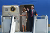 Stepping off the plane in England for the Trumps’ tour of the UK, Melania played it safe in a form-fitting midi dress by Roland Mouret. [Photo: Getty]