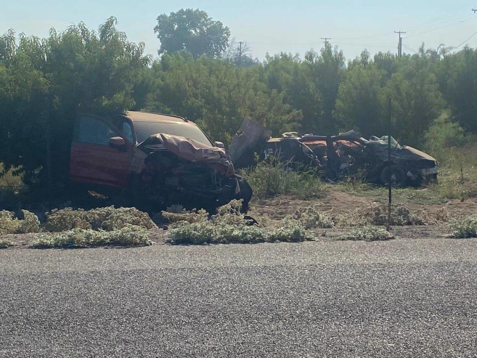 Two cars involved in a fatal crash Friday, Sept. 1, 2023, came to rest in an orchard near Jefferson and Bethel avenues in Fresno County.