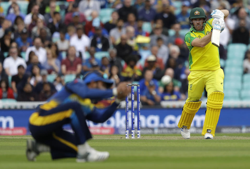 Australia's captain Aaron Finch Plays a shot off the bowling of Sri Lanka's Nuwan Pradeep during the World Cup cricket match between Sri Lanka and Australia at The Oval in London, Saturday, June 15, 2019. (AP Photo/Kirsty Wigglesworth)